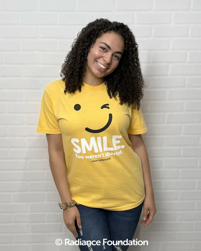 “Smile. You Weren’t Aborted.” T-Shirt