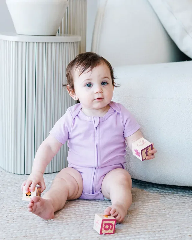 Short Sleeve Zipper Bodysuit In Lilac, 0-3m