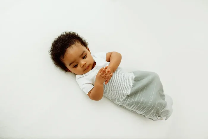 Swaddelini Grey Arms Out™ Short Sleeve Sleep Sack