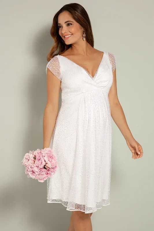 White maternity wedding dress with polka dot lace