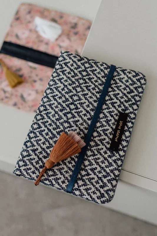 Wrap clutch with tassel water rituals